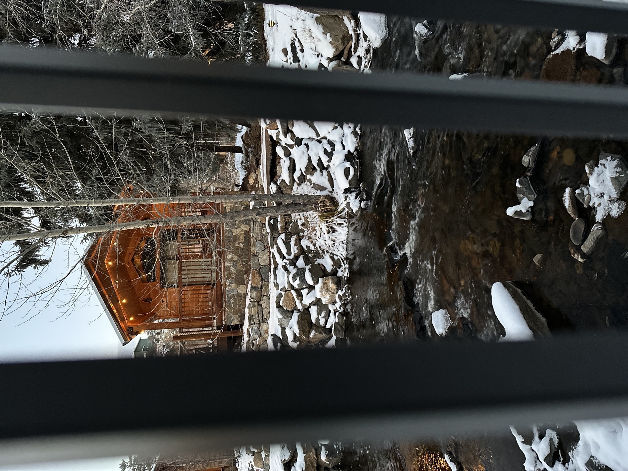 Snowy creek view from window