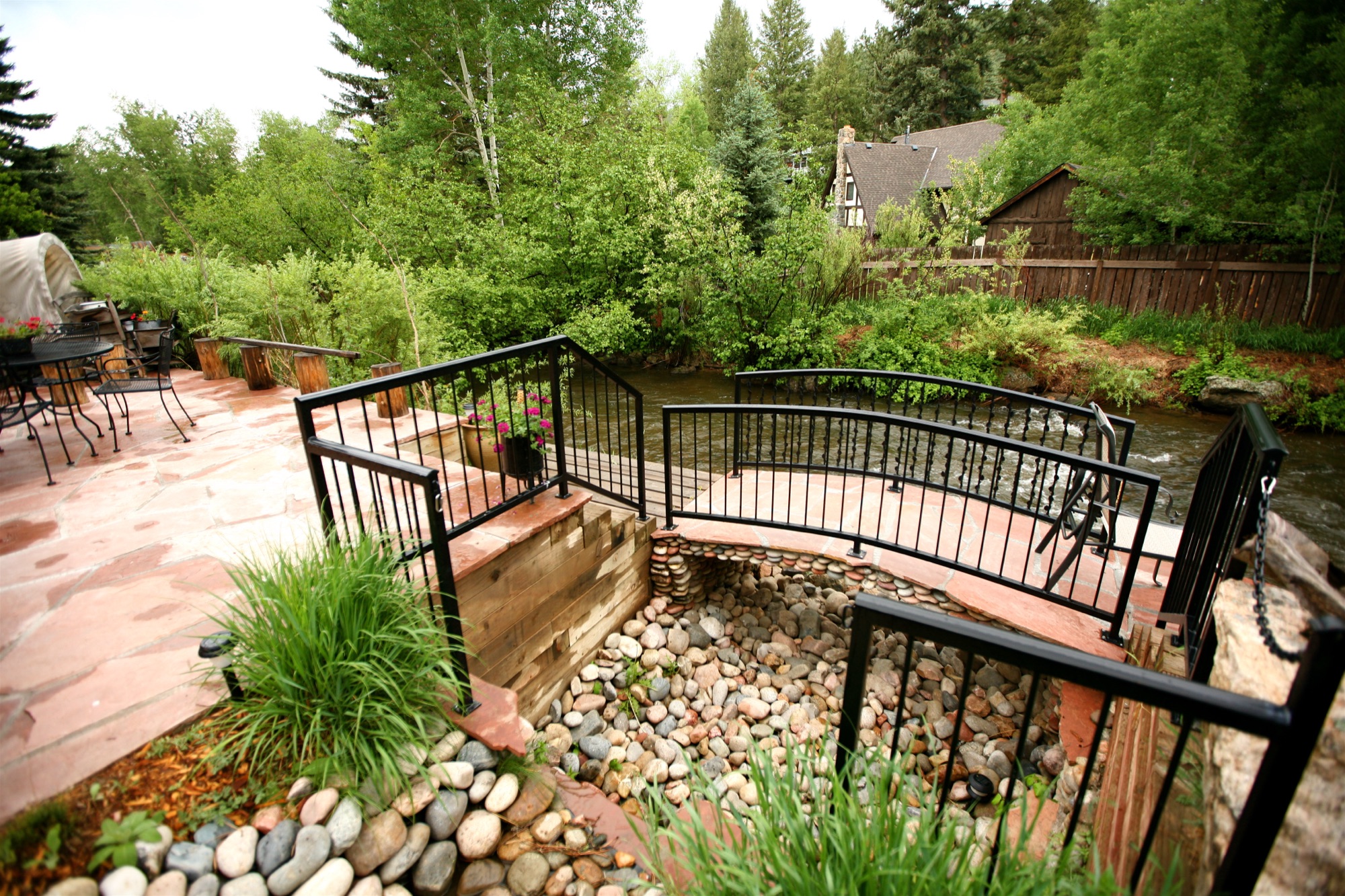 Stone patio with bridge