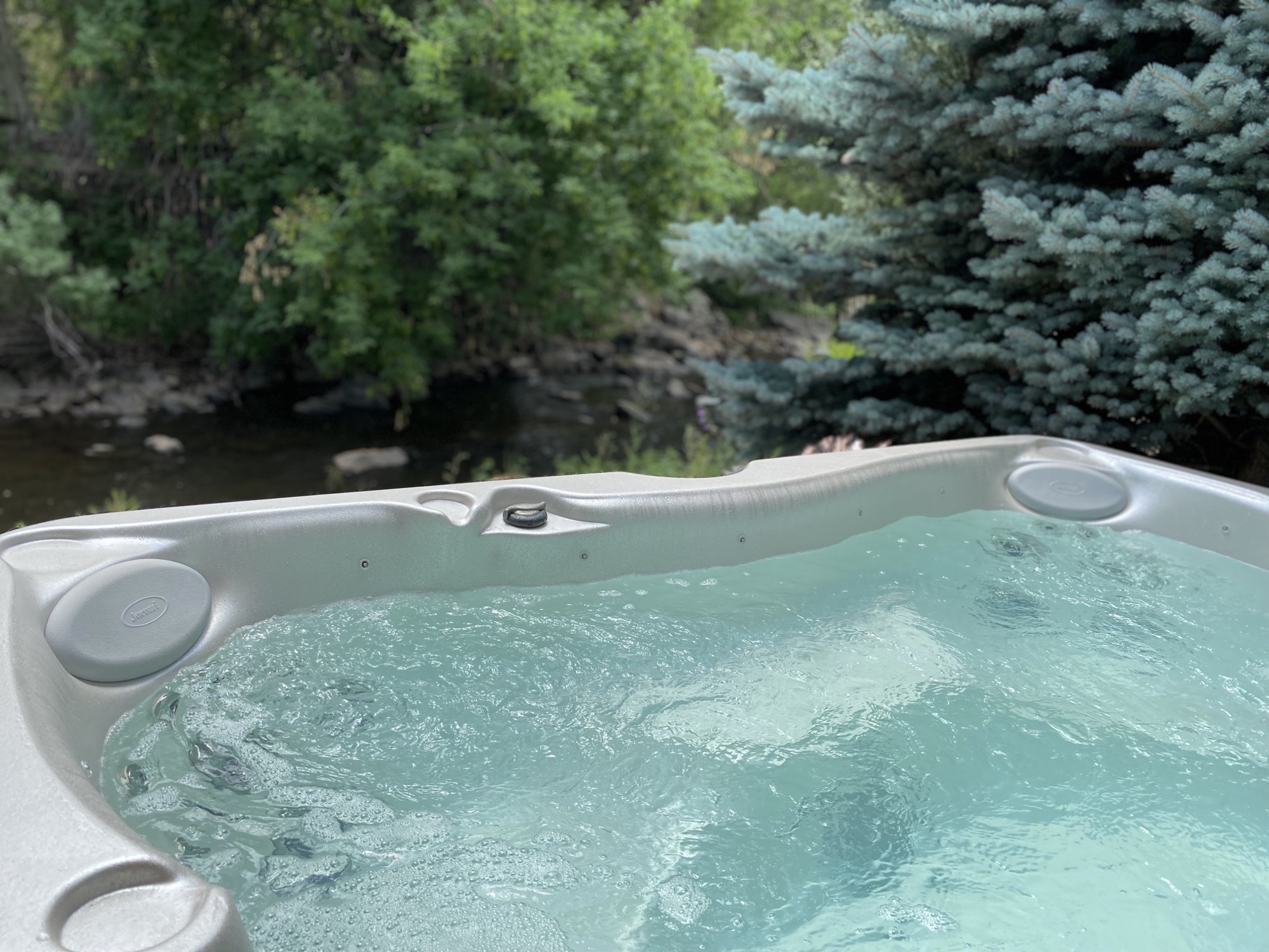 Hot tub with creek views